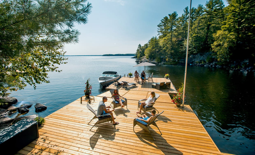 Floating dock construction on a calm lake with modular decking and flotation system