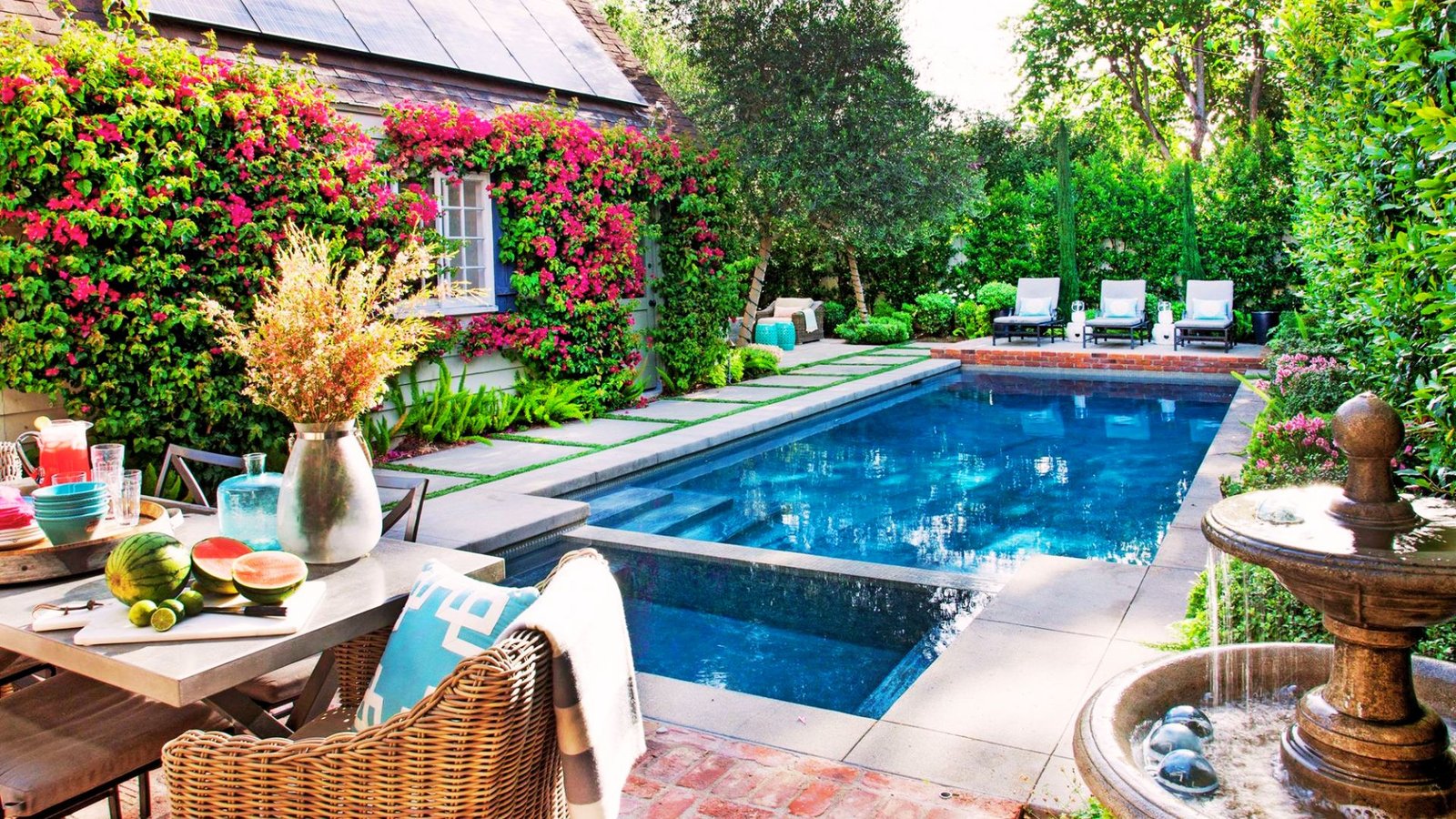 Custom finishes and features in a luxury inground pool.