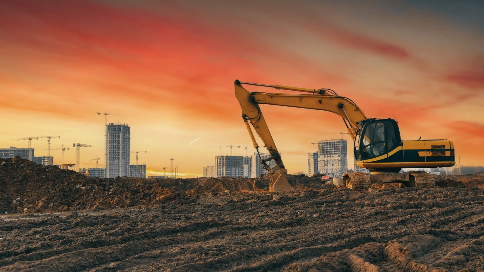 Preparing and leveling land before slab construction.